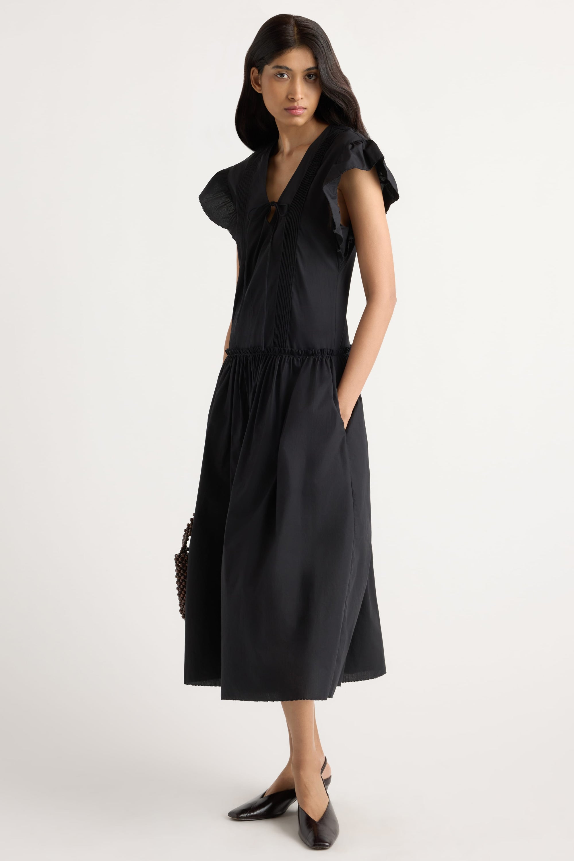 black dress with pleats Hand Pleated Column Naira Pleated Maxi Dress Bow-Detail Pleated A-Line Mini Dress