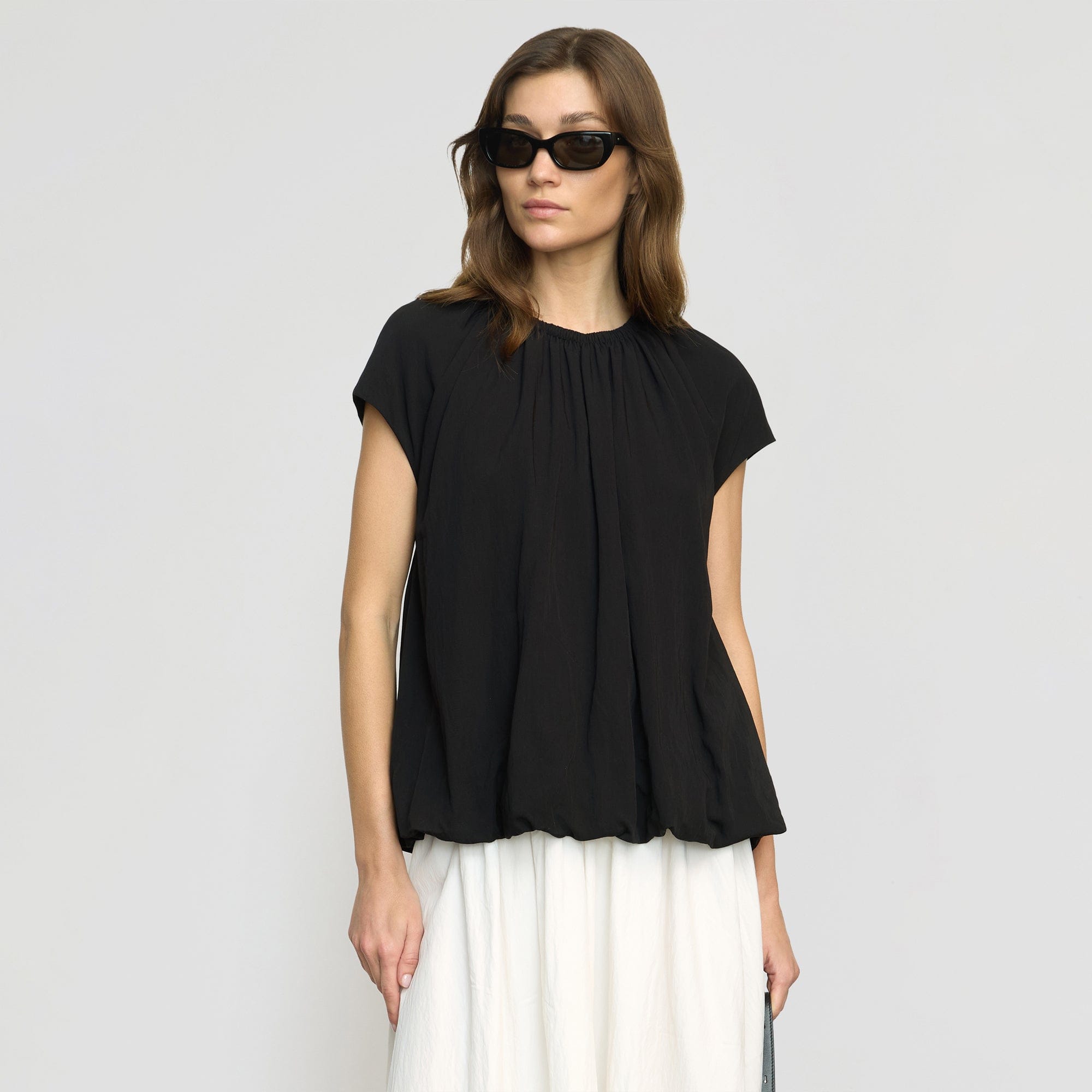 black bubble hem blouse